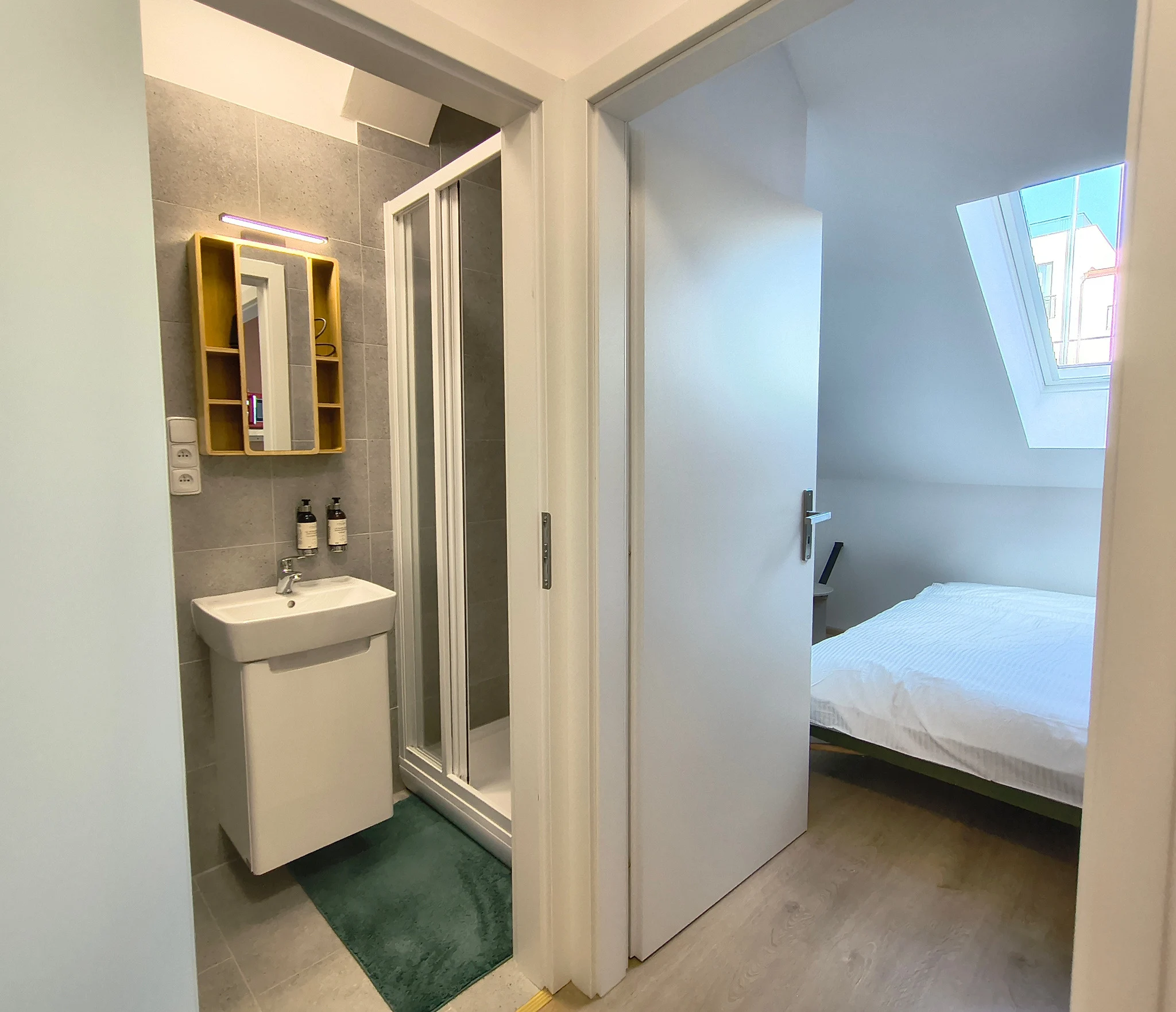 Interior or bathroom photograph of room 406 at CHILL Apartments