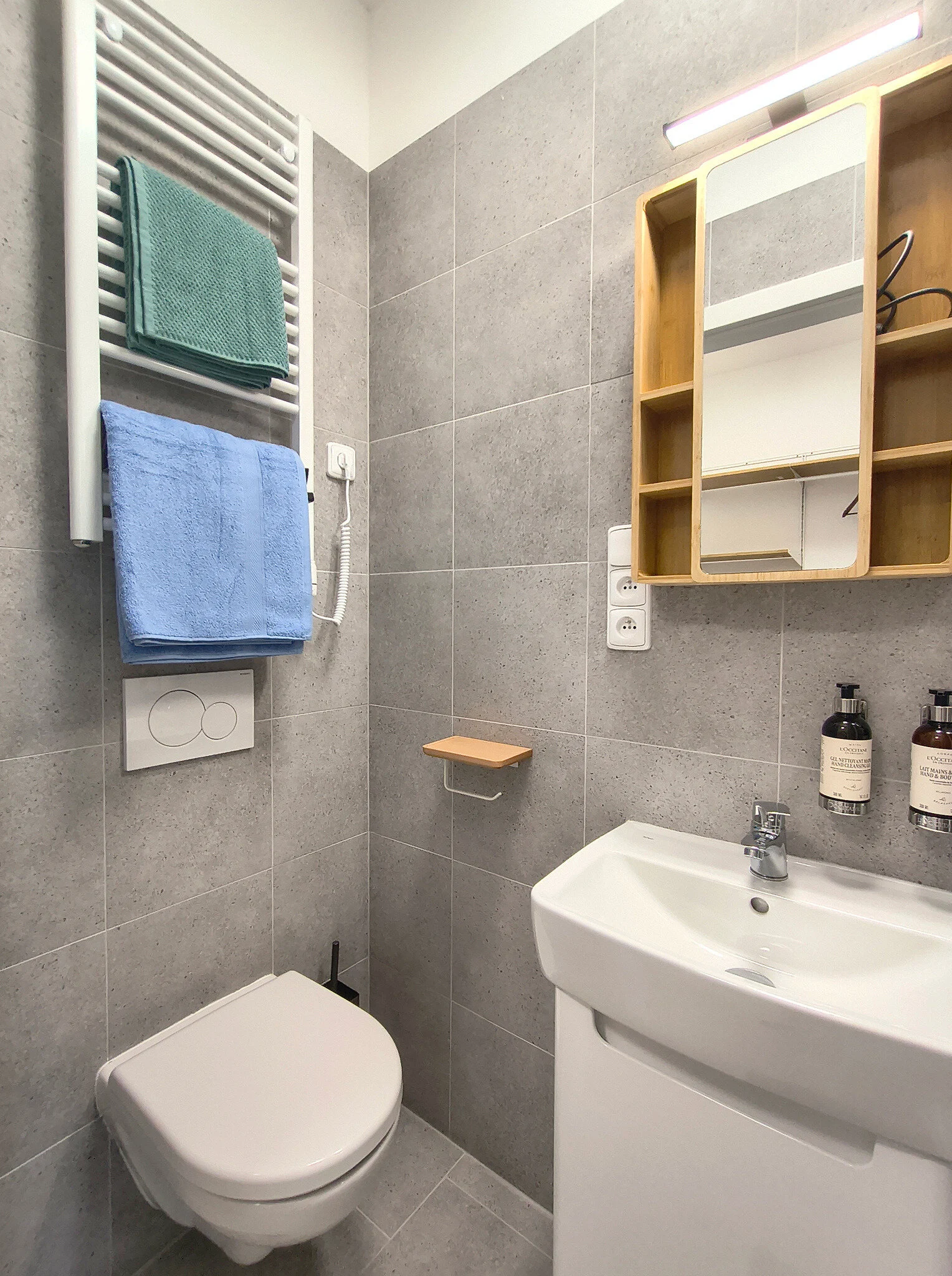 Interior or bathroom photograph of room 406 at CHILL Apartments