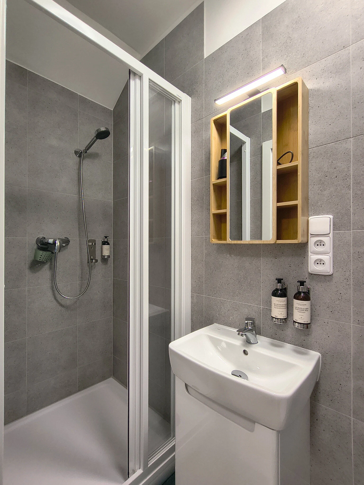 Interior or bathroom photograph of room 407 at CHILL Apartments