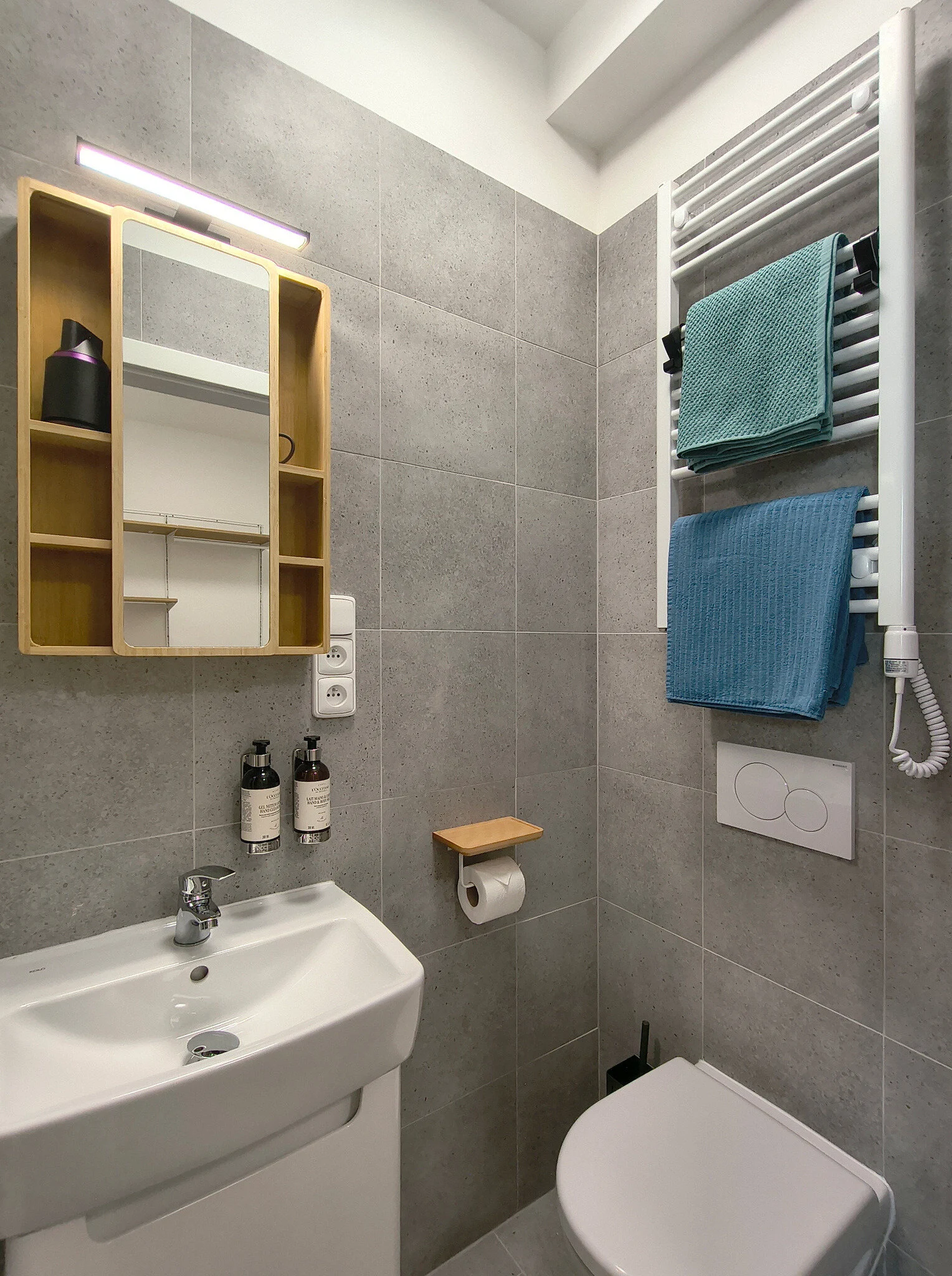 Interior or bathroom photograph of room 407 at CHILL Apartments