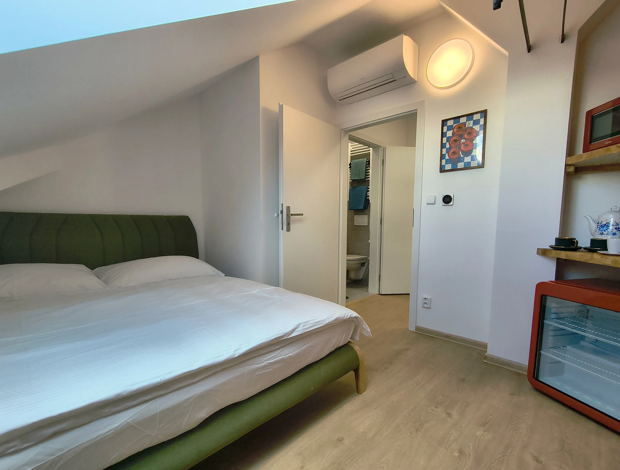 Interior or bathroom photograph of room 407 at CHILL Apartments